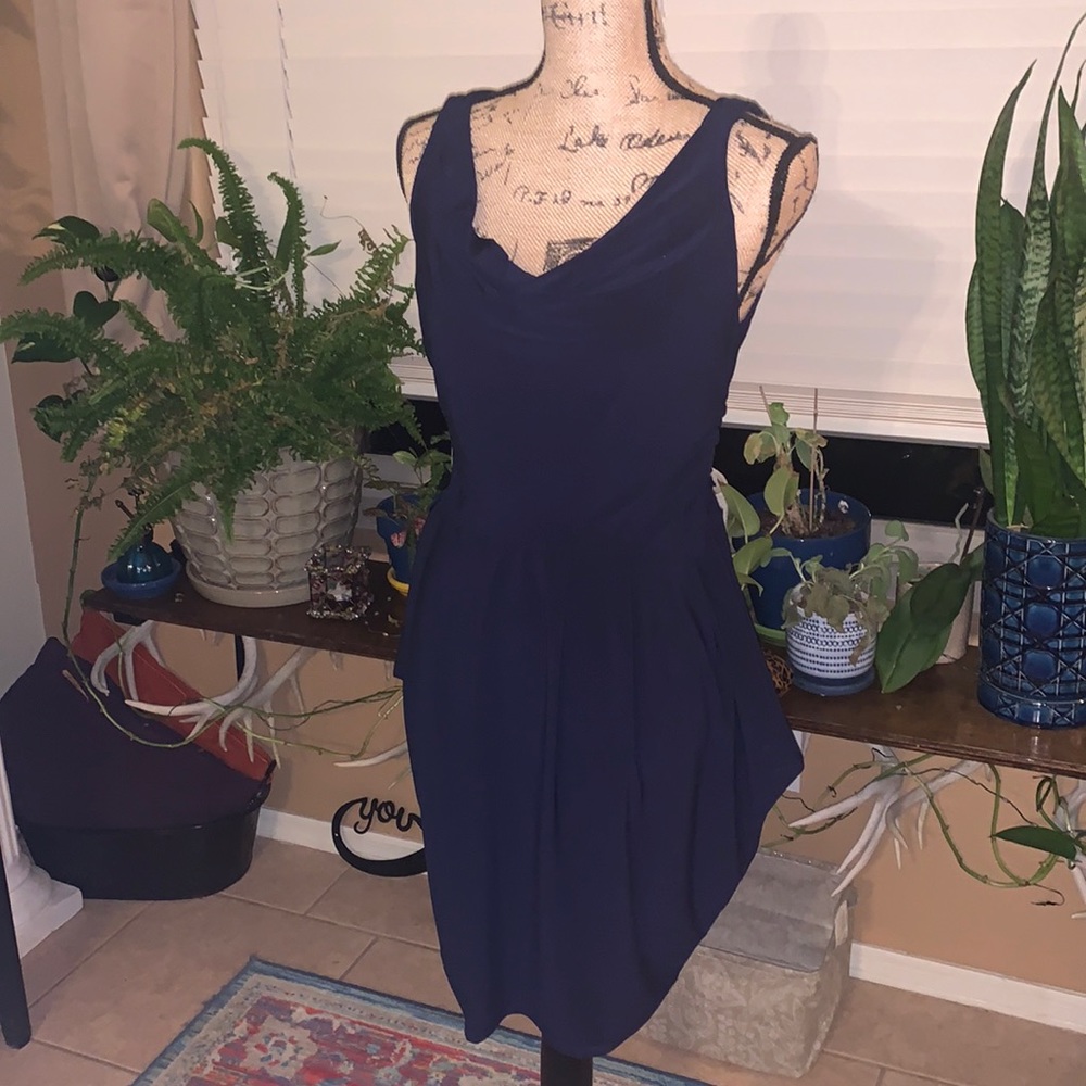 Day Trip navy dress. Can be dressed up or down. Stretchy material.